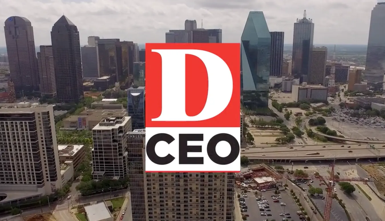 City skyline with a text overlay that says CEO. The skyline was filmed by an experiential video production company based in Dallas, Texas.